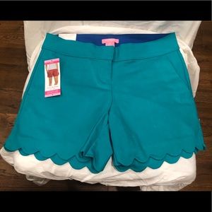 Scalloped edged teal shorts
